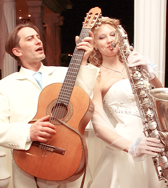 Bride and Groom Playing Instruments